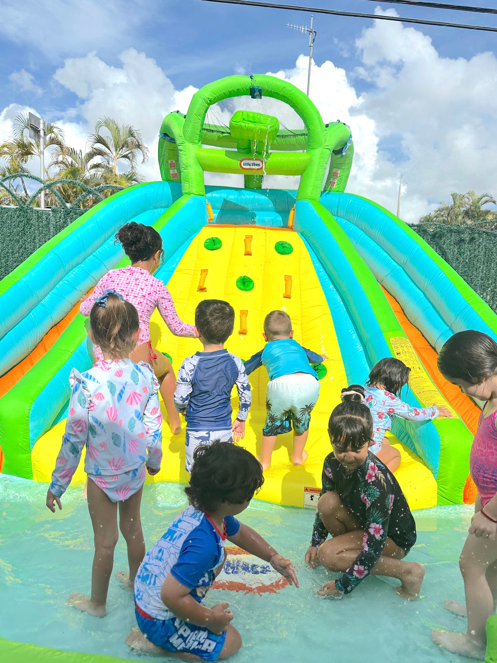 Children enjoying water play at Happy Little Crabs Child Care